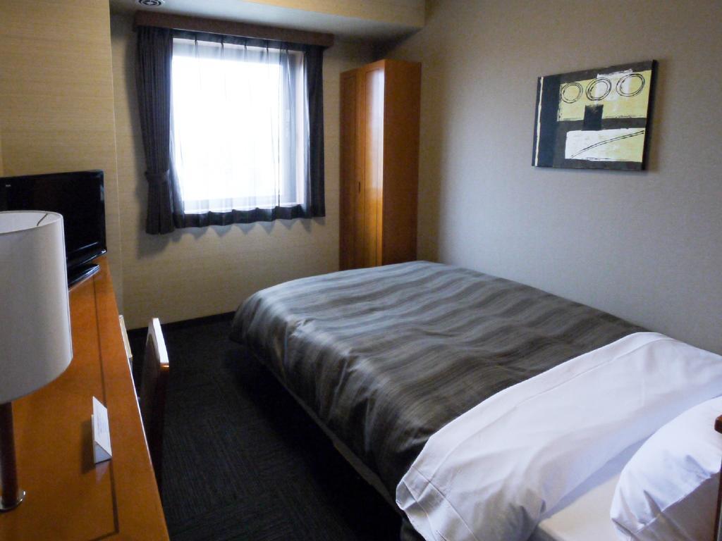 Hotel Route-Inn Yonezawa Ekihigashi Екстер'єр фото