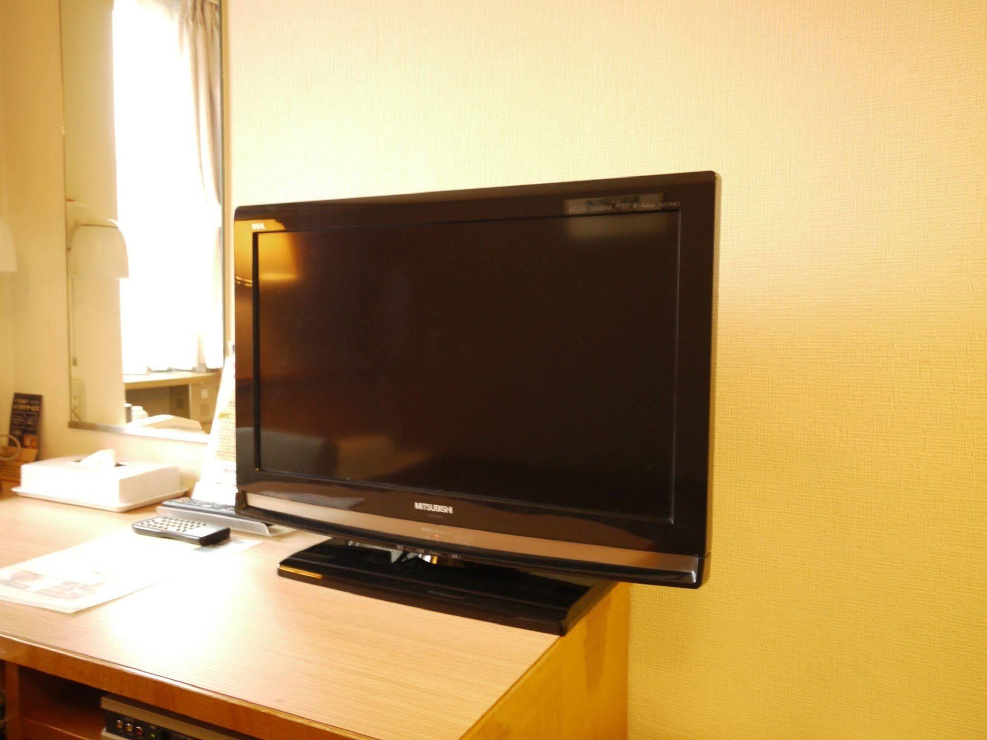 Hotel Route-Inn Yonezawa Ekihigashi Екстер'єр фото